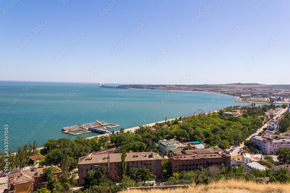 beautiful view of the black sea, the Crimean bridge and the embankment of the resort city of Kerch from mount mithridat on a summer day