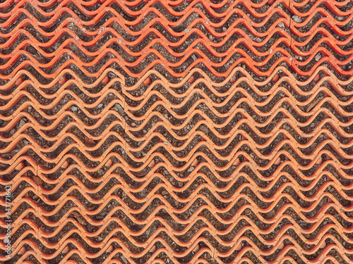 The texture of the plastic grille is red. Wave pattern