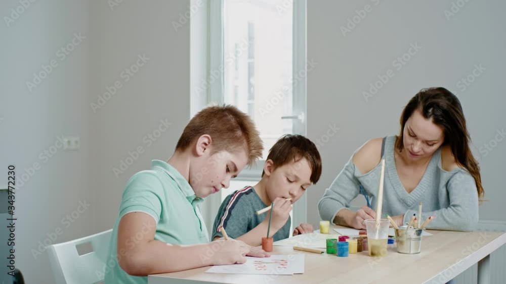 Happy children drawing at home Happy children drawing at home