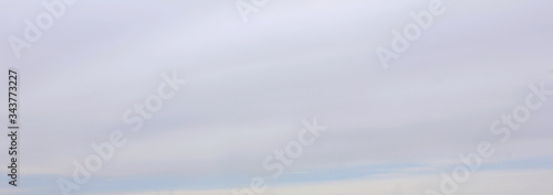 Cloudy sky nature background. Stormy clouds skyscape view concept. White puffy clouds on the sky, clouded horizon wallpaper on gloomy day 