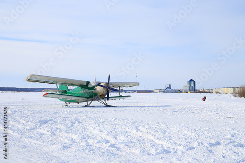 Fototapeta Naklejka Na Ścianę i Meble -  Soviet and Russian AN-2 aircraft in the city of Nadym in winter in Northern Siberia