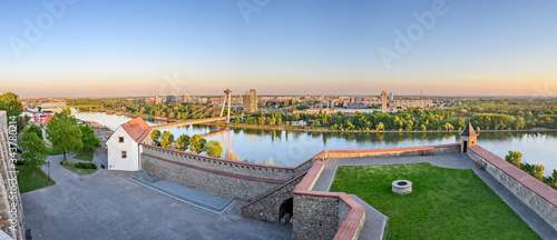 Photography Sunset view of Danube river with Petrzalka borough in background from Bratislava