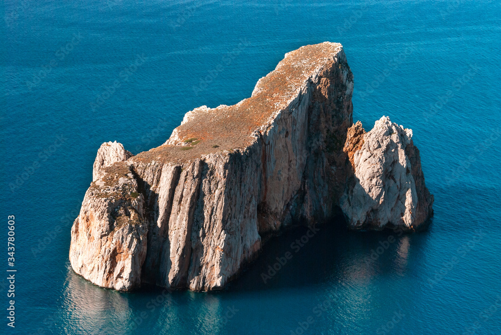 Sardegna, veduta della costa di Iglesias e scoglio chiamato Pan di Zucchero, Italia