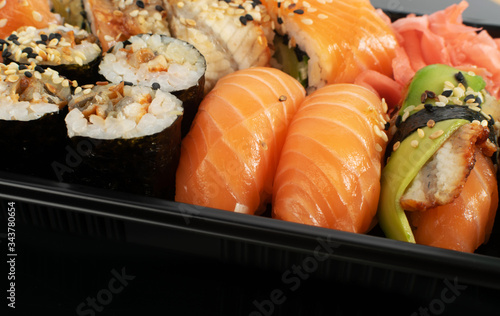 Plastic Container with Sushi Set Ready for Takeout Delivery