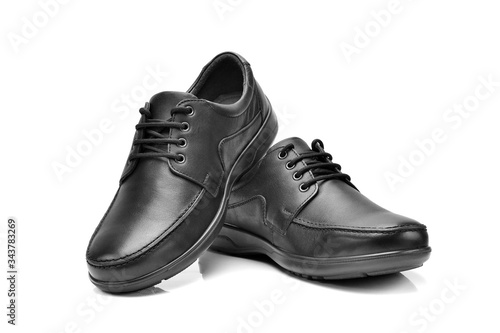 black leather men shoes isolated on white background, front view