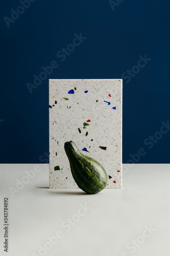Pumpkin with tile on table
