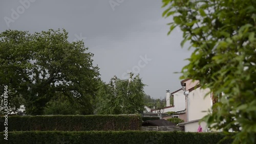 Wallpaper Mural Paysage urbain de quartier sous le vent, la pluie et ciel d'orage Torontodigital.ca