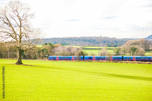 A TransPennine Express passenger train in the countryside UK