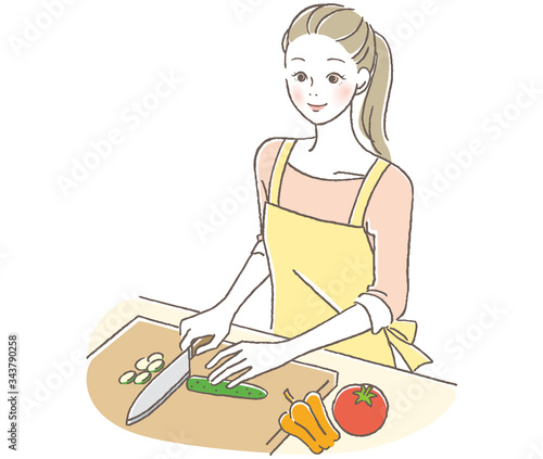 料理する女性