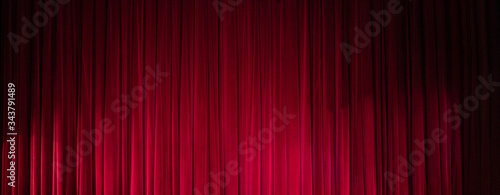 Fotografia Theatrical dark red velvet curtain