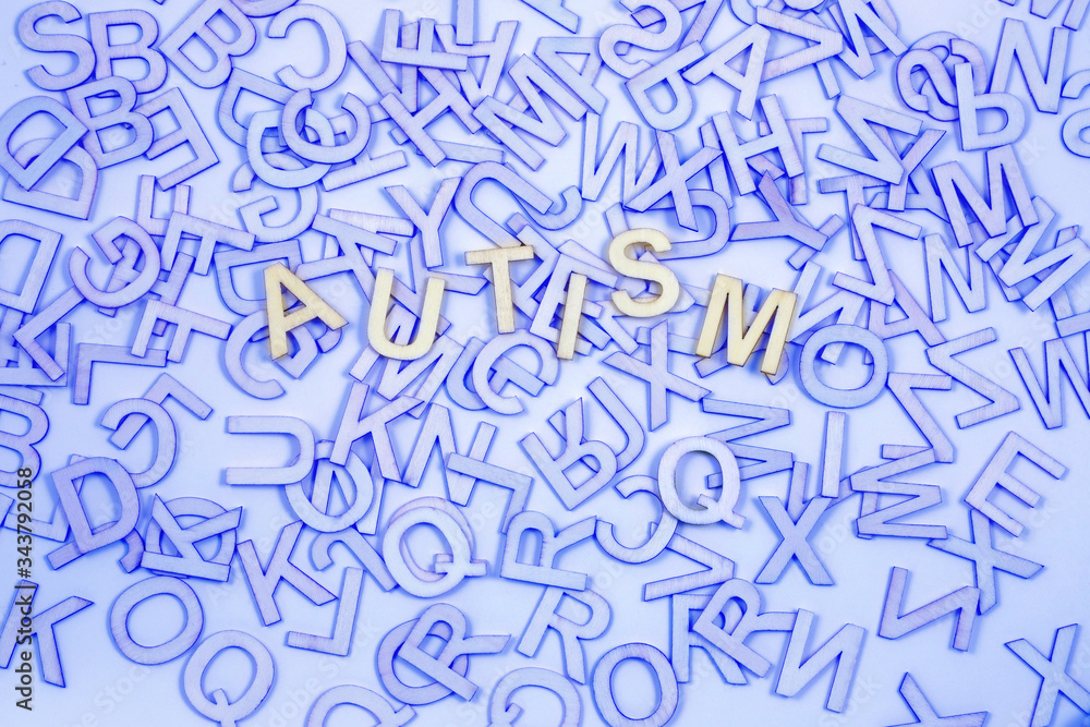 Chaotic Autism Alphabet Concept  Background - Blue A to Z letters scattered randomly across background with the word AUTISM picked out in the centre
