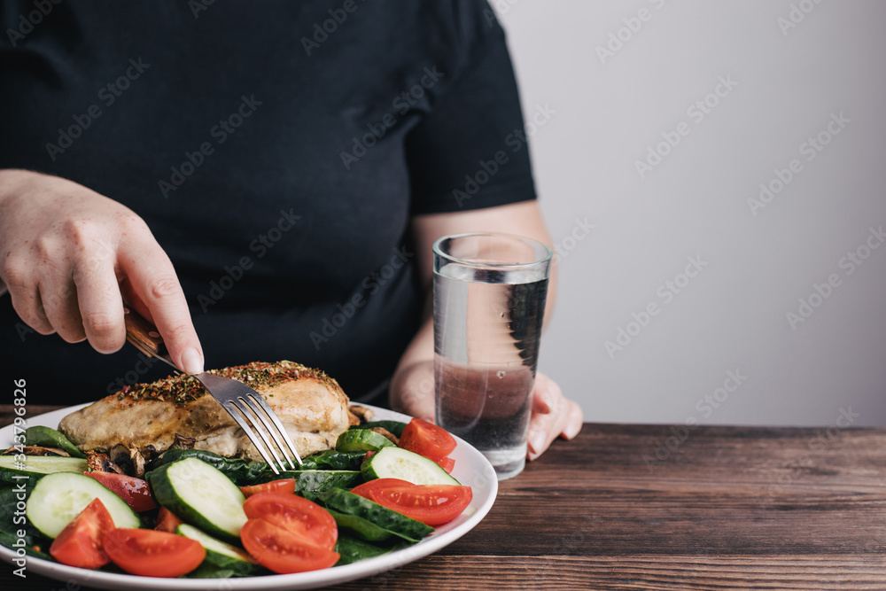 Diet concept, healthy lifestyle, low calorie food. Dieting. Closeup portrait of woman eating healthy food