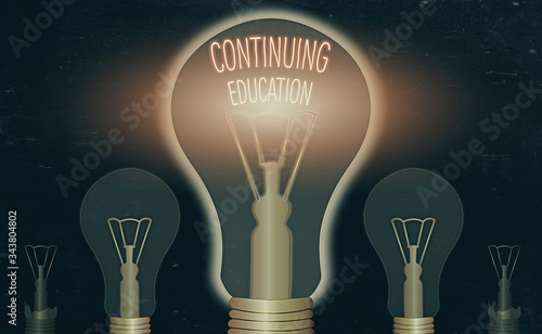 Writing note showing Continuing Education. Business concept for Continued Learning Activity professionals engage in photo