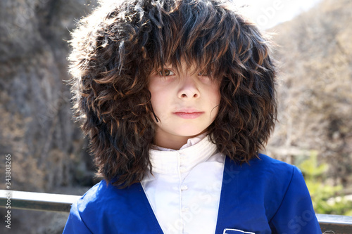 Boy in traditional Karachai clothes photo