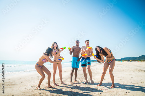 Friends having fun on the beach