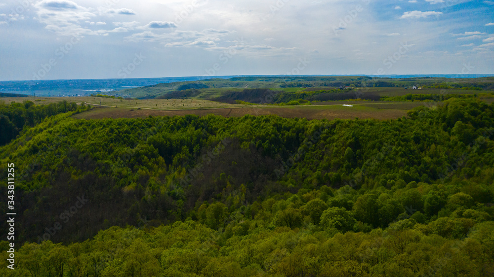 Aerial View of drone flying over the green forest Aerial View of drone flying over the green forest