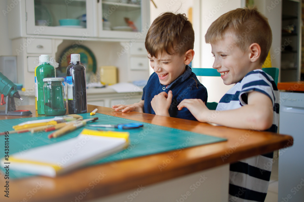 Fototapeta premium Brothers having fun at home during quarantine