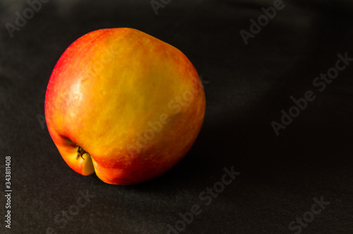 The ripe apple isolated on a black background