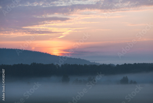 sunrise over the forest © Tatiana Koshutina