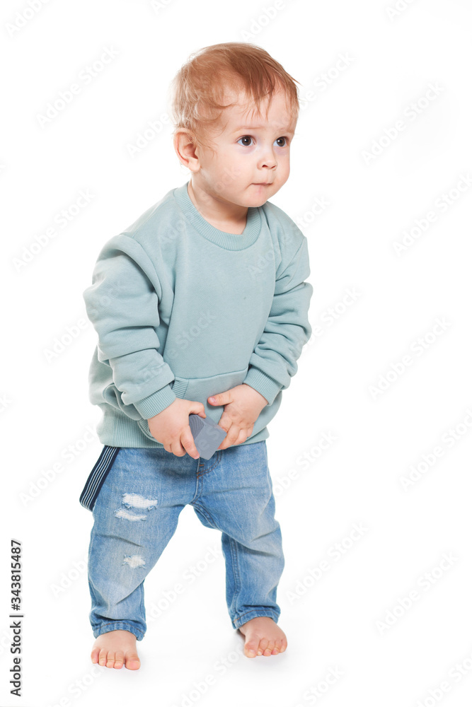 Fashionable portrait of a charming baby boy in a mint sweatshirt Fashionable portrait of a charming baby boy in a mint sweatshirt