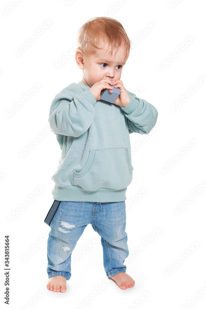 Fashionable portrait of a charming baby boy in a mint sweatshirt Fashionable portrait of a charming baby boy in a mint sweatshirt