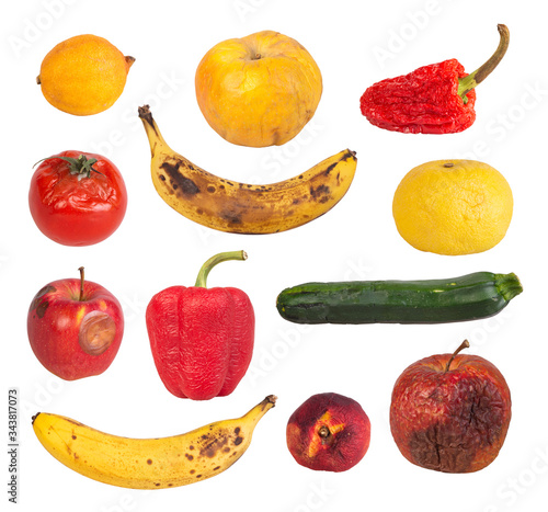 Fototapeta Naklejka Na Ścianę i Meble -  Rotten fruits and vegetables isolated on white background