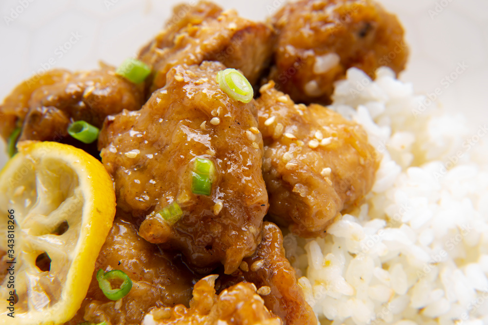 Sticky Chinese Lemon Chicken on the plate Sticky Chinese Lemon Chicken on the plate