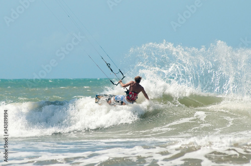 Jericoacoara / Ceará - Brazil / November 2009:Man practicing kitesurfing on the beach in Brazil.