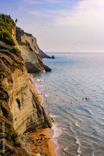 Loggas beach at Peroulades is a paradise beach at high rocky white cliff and crystal clear azure water in Corfu, close to Cape Drastis, Ionian island, Greece, Europe