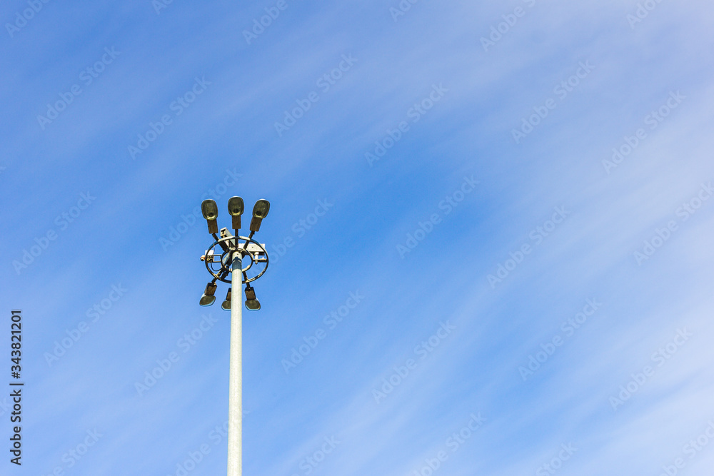 lighting mast lantern construction on blue sky background lighting mast lantern construction on blue sky background