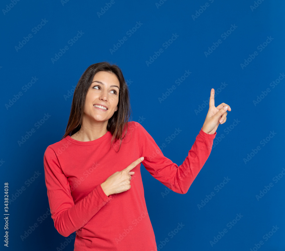 Brunette young woman wearing a red T-shirt Brunette young woman wearing a red T-shirt