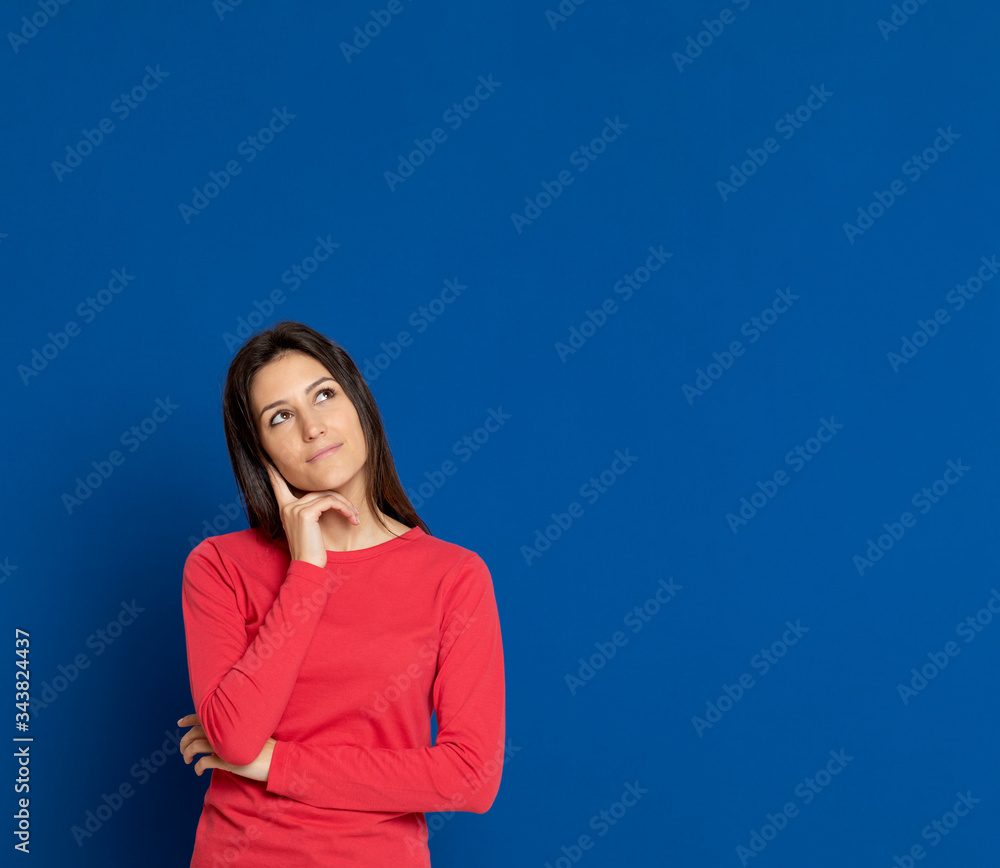 Brunette young woman wearing a red T-shirt Brunette young woman wearing a red T-shirt