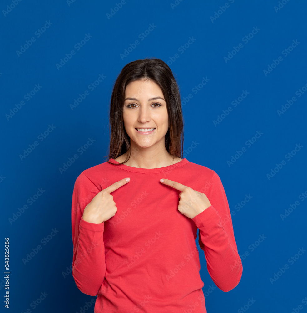 Brunette young woman wearing a red T-shirt Brunette young woman wearing a red T-shirt