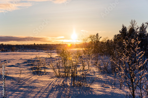 Winter sunset in Nuorgam, Lapland, Finland photo