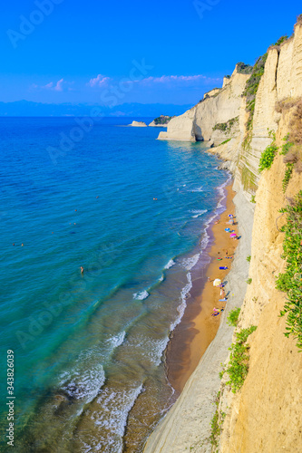 Loggas beach at Peroulades is a paradise beach at high rocky white cliff and crystal clear azure water in Corfu, close to Cape Drastis, Ionian island, Greece, Europe