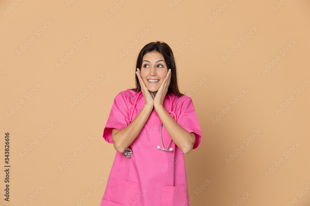 Young doctor with a pink uniform Young doctor with a pink uniform