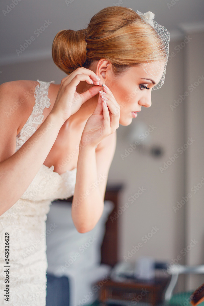 Fototapeta premium Model bride posing in a hotel