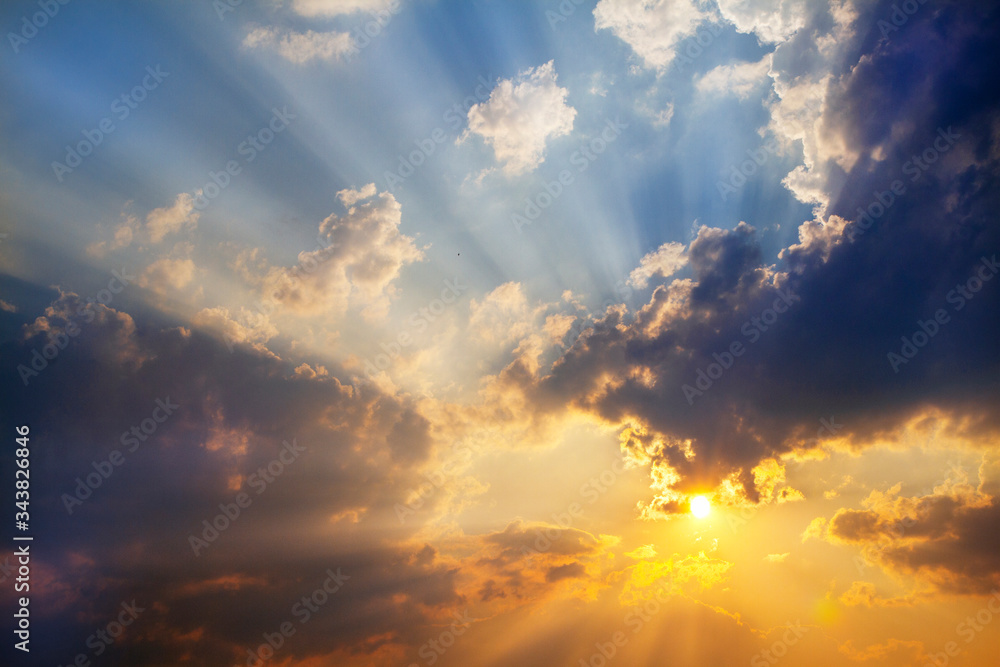 Sunset or sunrise with cloud and ray light on blue sky and other atmospheric effect