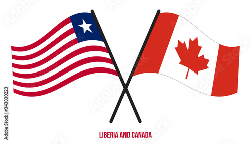 Liberia and Canada Flags Crossed And Waving Flat Style. Official Proportion. Correct Colors