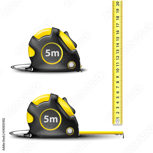yellow Retractable steel measuring tape with imperial and metric measurements isolated on white background
