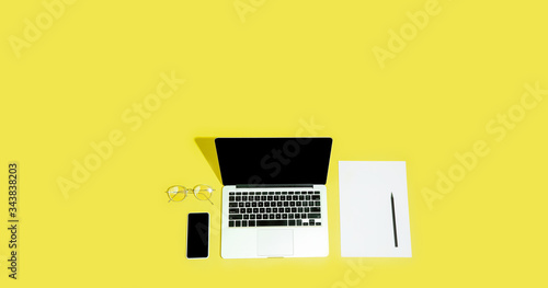 Gadgets, devices on top view, blank screen with copyspace, minimalistic style. Technologies, modern, marketing. Negative space for ad. Coral on background. Stylish, trendy. Workplace for productivity.