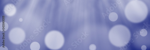 Abstract blue bokeh banner background - birthday, father's day, valentine's day panorama - blurry bokeh circles on a blue background. Spring or summer concept
