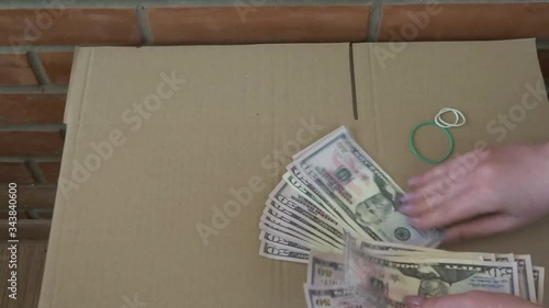 Recalculation of 50 dollar bills. Fifty dollars