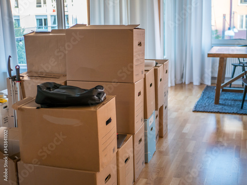 Photos Moving boxes and storage boxes in different sizes at home prepered for move