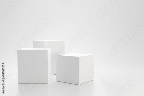 White studio template and cube pedestal on simple background with product shelf. Blank studio podium for advertising. 3D rendering. photo