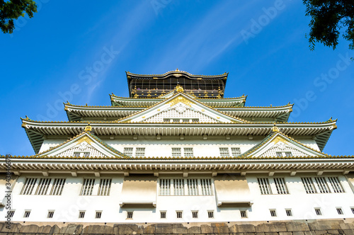 Osaka castle at sunset on a clear day