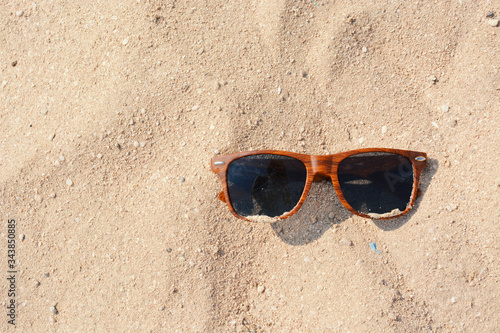 Dark Brown Sunglasses on Beach Sand in Greece