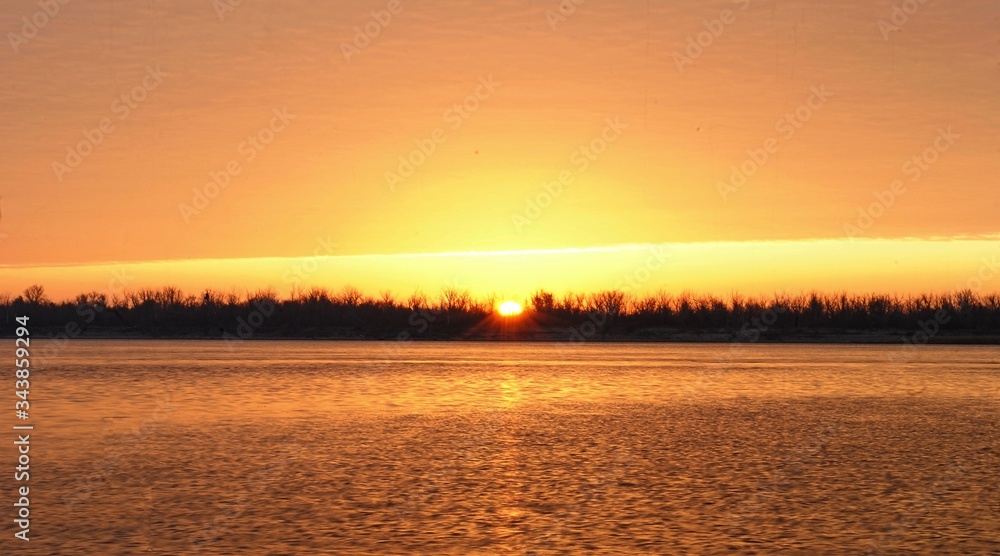 Fototapeta premium sunset over the field