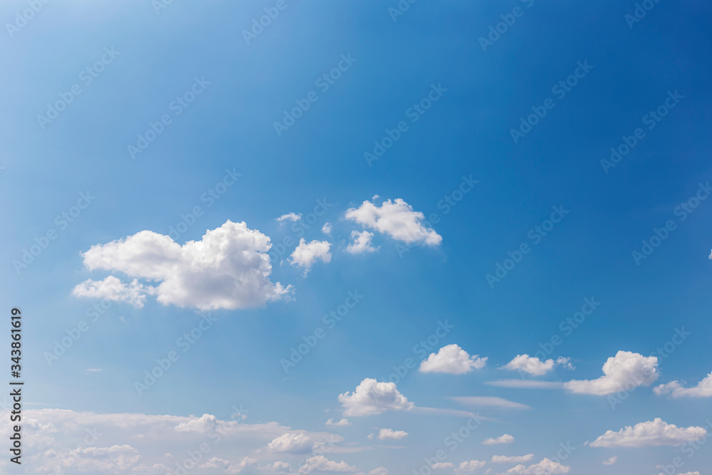 Fototapeta premium Blue sky background with clouds' natural background.