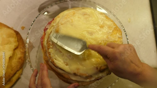 Napoleon Cake Chef baking. Crisp flaky pastry custard creamy. Close-up isolated top view. POV.